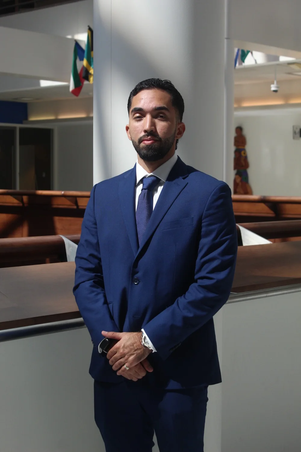 Jean Paul Molinares in a navy suit
